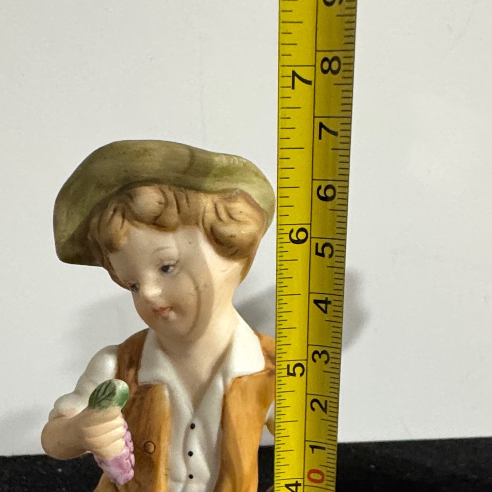 vintage hand-painted porcelain figurines of a boy and girl carrying baskets. - Picture 2 of 16